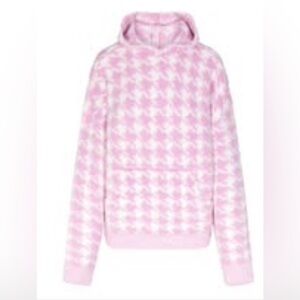 SKIMS Pink and White Houndstooth Sweater
